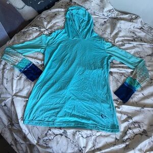 Lightweight hooded swim shirt / rash guard in a soft aqua blue 🌊